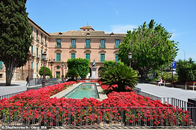 Jade said she and her partner went travelling but but couldn't stop thinking about Spain Pictured: The picturesque city hall in Murcia