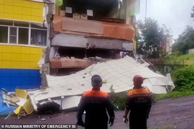 Rescuers inspecting a damaged kindergarten building in Russia's Kamchatka region after an 8.8 magnitude earthquake struck off Russia's far east coast