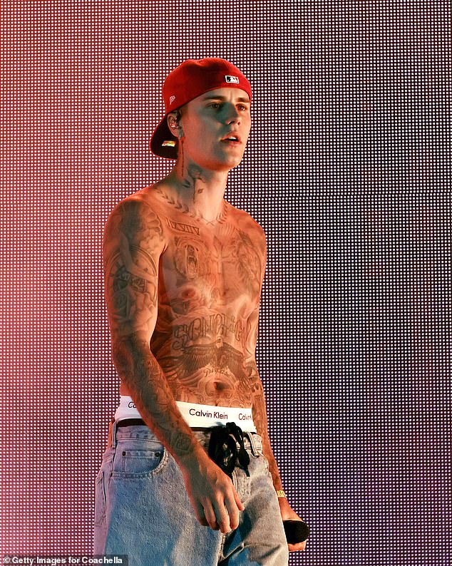 Roman also had an awkward exchange with Justin Bieber, revealing he put his foot in it during a private listening session for his 2020 album, Changes (Justin pictured in 2022)