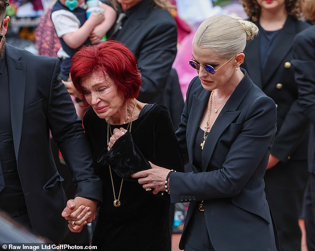 There appeared to be a moment where Sharon stumbled as she walked to the tributes - with Jack and Kelly able to support her