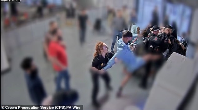 At one point he could be seen kicking out at an officer while his brother grappled