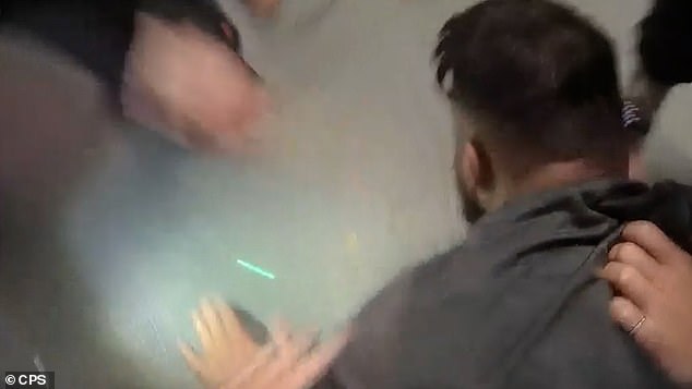 Amaad can be seen being detained on the ground after the altercation