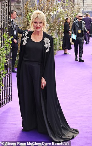 Joanna Lumley, 79 opted for an elegant gown with an embellish cape