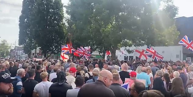Thousands could be seen gathered on the high street with flags and placards