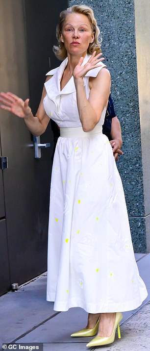 She was walking into a building