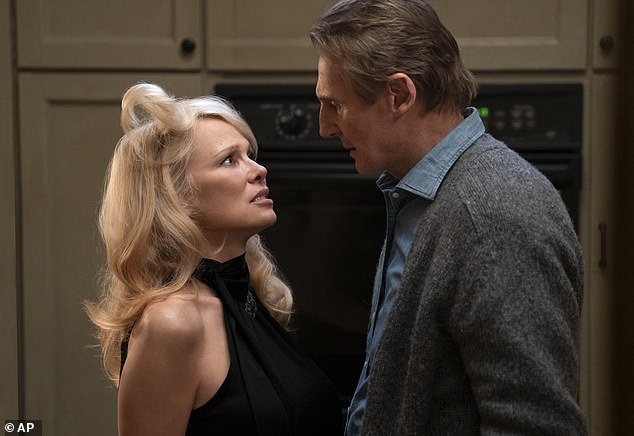'She has been telling friends that he is smitten and does a lot of sweet things for her, like sending her flowers, and spending time with her sons and dogs,' said the source
