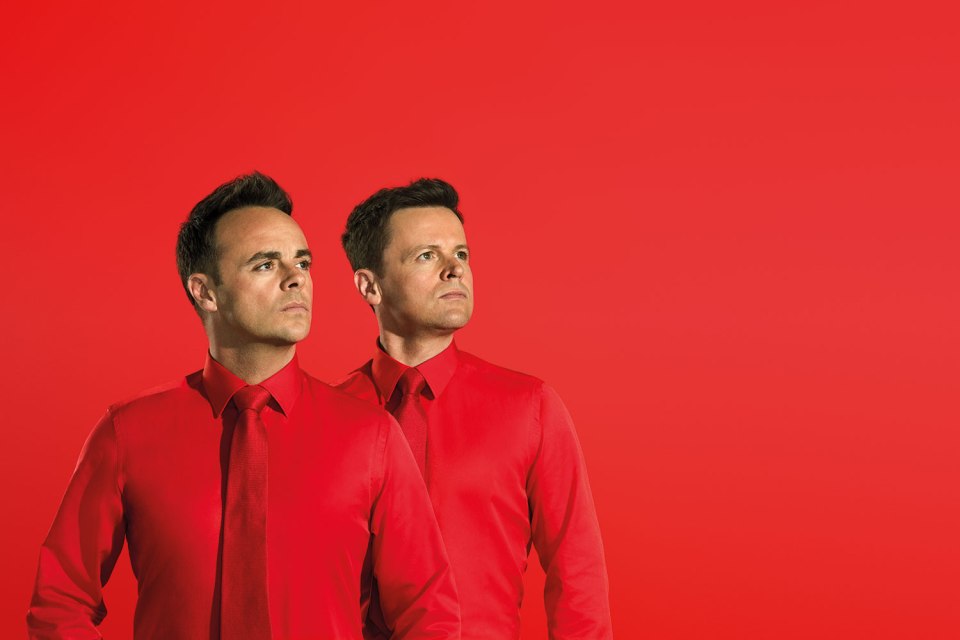 Ant and Dec in red shirts against a red background.