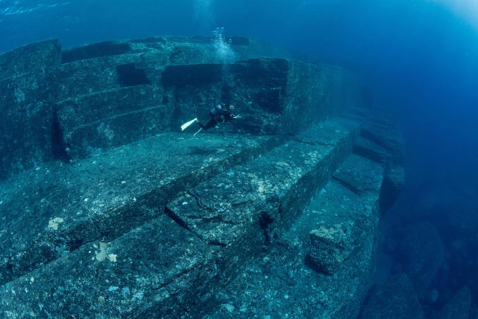 Scuba diver exploring the Yonaguni Monument in Japan.