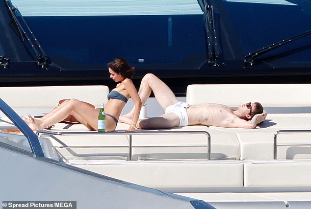The couple enjoyed the summer heat from the boat
