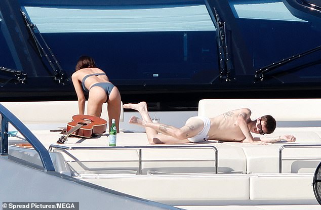 Cruz ensured he got the best tan in his skimpy speedos