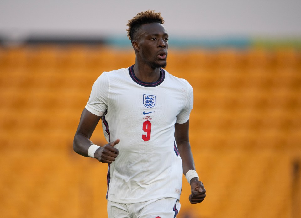 Tammy Abraham, wearing an England soccer uniform, during a game.