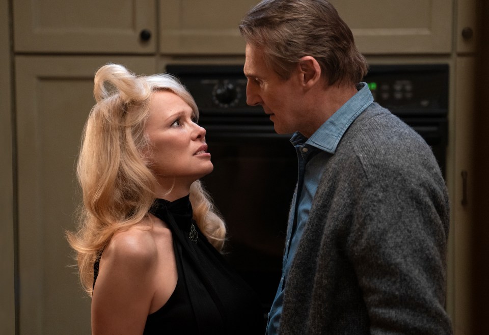 Pamela Anderson and Liam Neeson in a scene from "The Naked Gun."