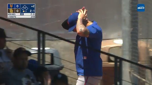 Butto - who joined the Mets at 19 - appeared distraught as he walked off in disbelief