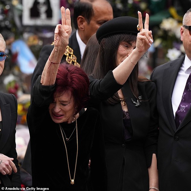 During the funeral, Sharon also held her hands up and gave a double peace sign - a gesture which has become synonymous with the metal star