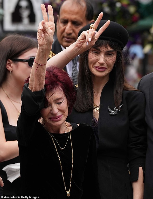 Lastly, Aimee, 41, also pinned a bat brooch to her blazer as she joined her family in paying reference to Ozzy's iconic career