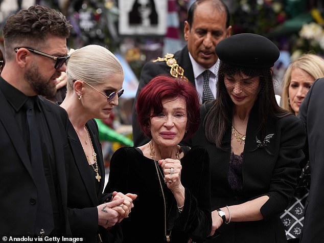 His grief-stricken wife Sharon and children Jack, Kelly, Aimee and Louis led the parade and stopped at Black Sabbath Bridge to an outpouring of love
