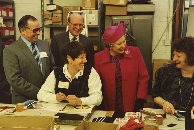 Queen Elizabeth II during her visit to Launer's Hackney factory in 1991
