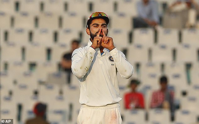Virat Kohli shushes Ben Stokes after the England batsman was dismissed in Mohali in 2016