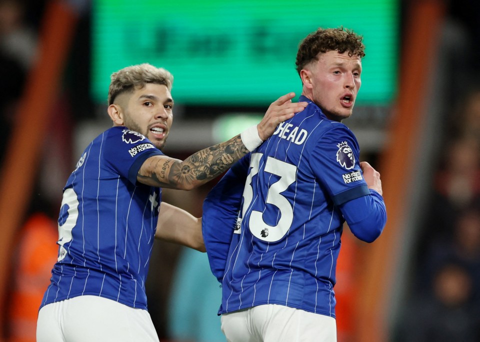 Nathan Broadhead of Ipswich Town celebrates a goal with a teammate.
