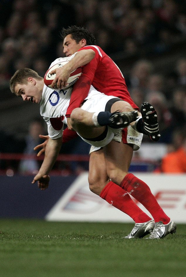 Henson's famous dump tackle on Mathew Tait was one of the defining images of Wales' first Grand Slam in 27 years