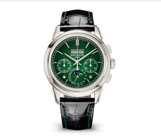 Patek Philippe watch with green face.