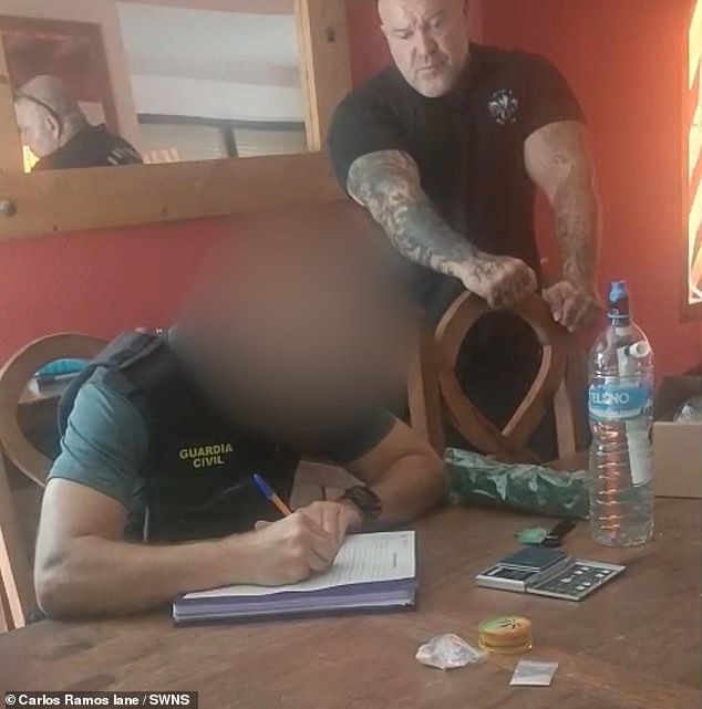 Joanne added: 'He (the occupant) wouldn't leave - he decided to blackmail us and said 'I'm not leaving, I'm going to stay in your house'. Pictured: Guardia civil police at Joanne and her husband's villa in Spain
