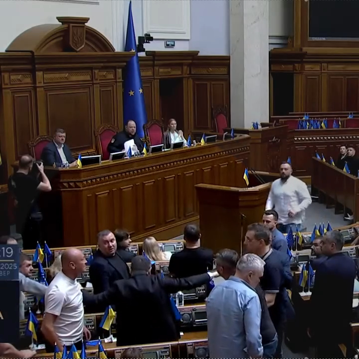 Disorder in a parliament chamber.