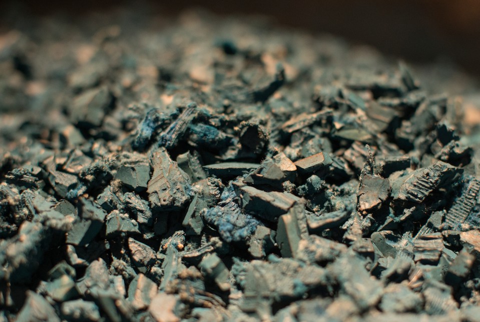 Close-up of blue rubber mulch.
