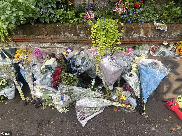There are a sea of floral tributes for the heavy metal icon near his home today
