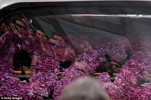 This purple floral tribute spelling out Ozzy's name was carried as part of the cortege in Wednesday's procession and similar has been seen at his Buckinghamshire mansion