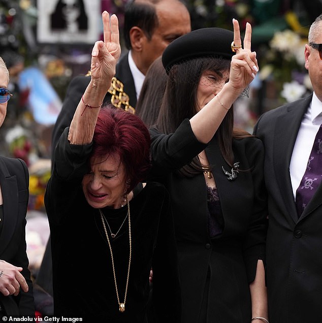 During the funeral, Sharon also held her hands up and gave a double peace sign - a gesture which has become synonymous with the metal star
