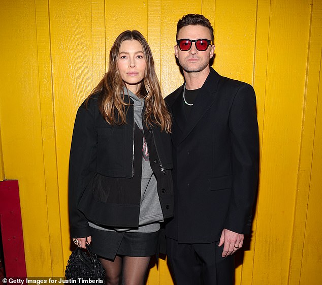 The pop star is pictured with wife Jessica Biel in 2024