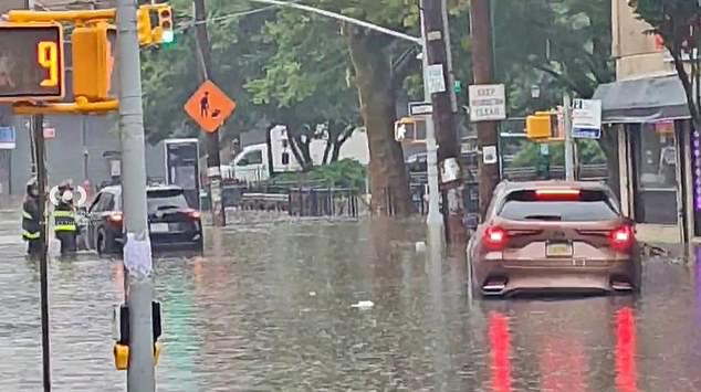 SUV's submerged  Water St and Front St
