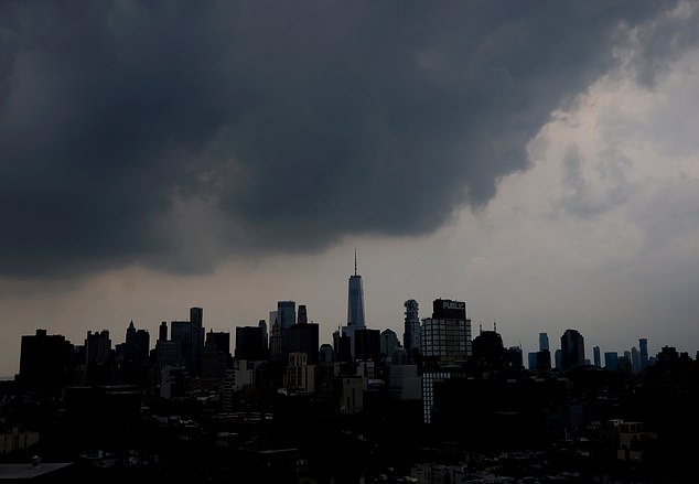 Mandatory Credit: Photo by John Angelillo/UPI/Shutterstock (15422495a) Dark storm clouds move in behind One World Trade Center and the Manhattan skyline on Thursday, July 31, 2025 in New York City. Storm Clounds Behind the Manhattan Skyline in New York, United States - 31 Jul 2025