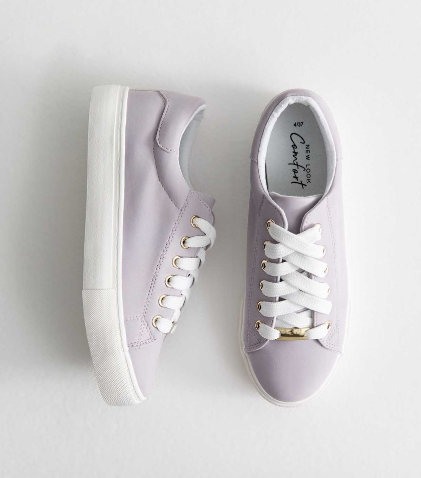 Lilac lace-up trainers.