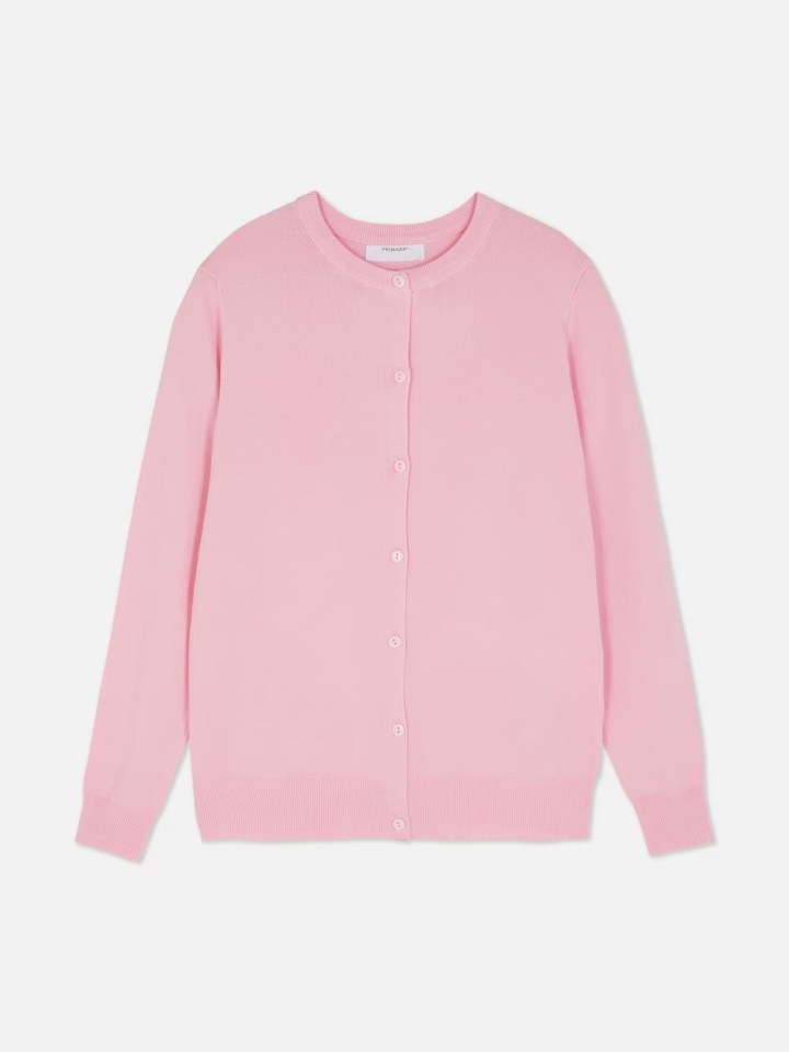 Pink cardigan sweater.