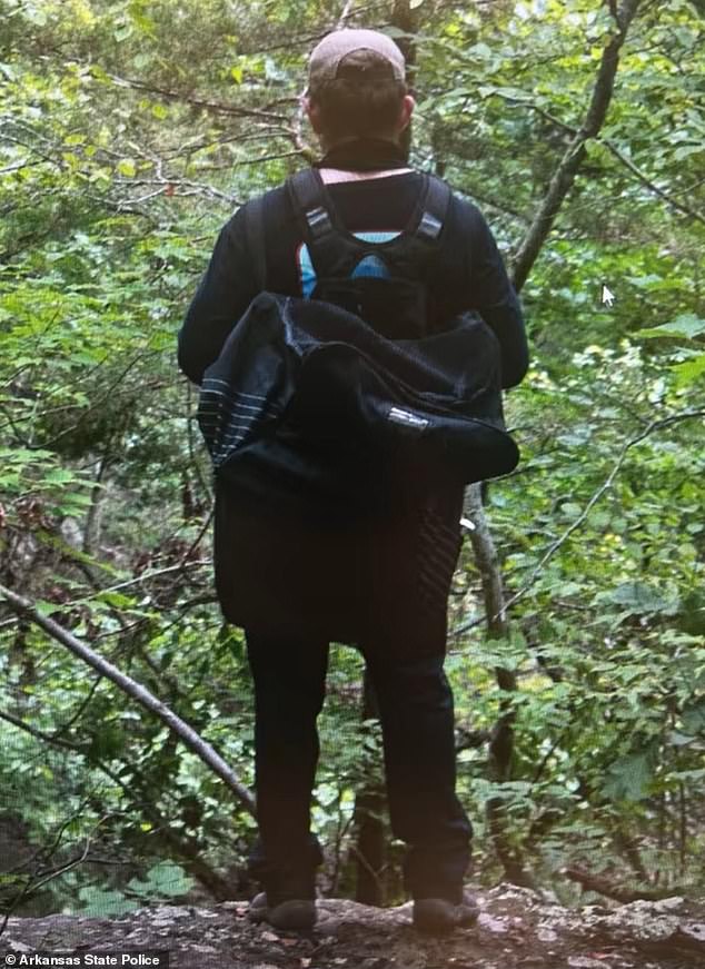 Investigators revealed that McGann had no connection to the couple he¿s accused of brutally stabbing to death. They previously released this image of a person of interest in the case