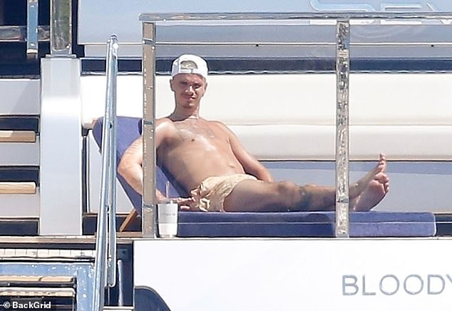 Romeo has been enjoying some time in the sun with his family following his split from his girlfriend Kim Turnbull