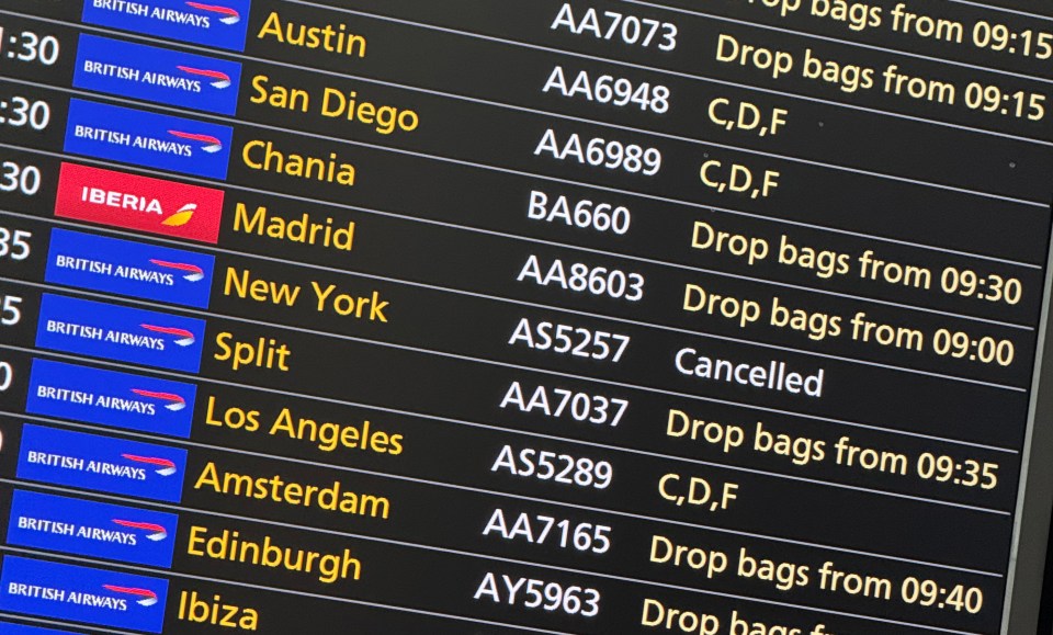 Heathrow airport departures board showing flight delays and baggage drop times.