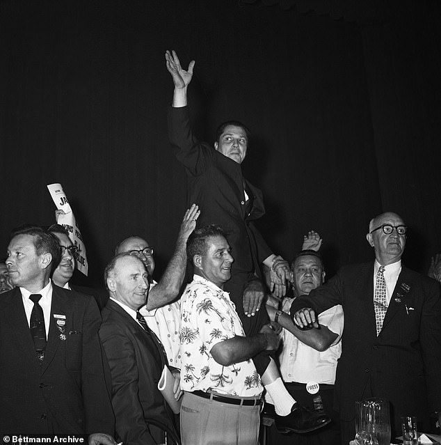 Pictured: Hoffa in Miami Beach, Florida, getting a boost from delegates after he won the election by a landslide in Octover 1957 as the newly-elected President of the International Teamsters Union