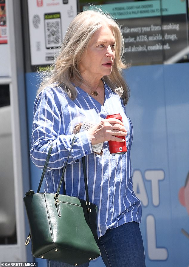 For her solo outing last week, D'Angelo looked effortlessly stylish as she stepped out in a summer linen shirt to run errands and pick up some snacks in sunny LA