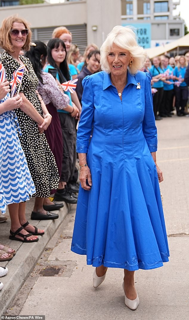 Camilla put her best fashion foot forward for the occasion and stepped out in the capital city, donning a royal blue frock
