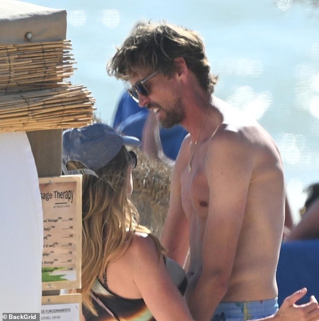 Abbey wrapped her arms around him, before Peter cheekily grabbed her behind