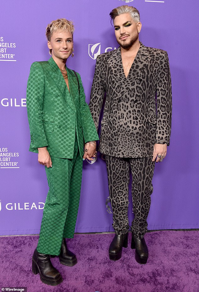 Adam Lambert (R, pictured in 2023) has reportedly amicably ended his relationship with boyfriend Oliver Gliese (L) after four years of dating
