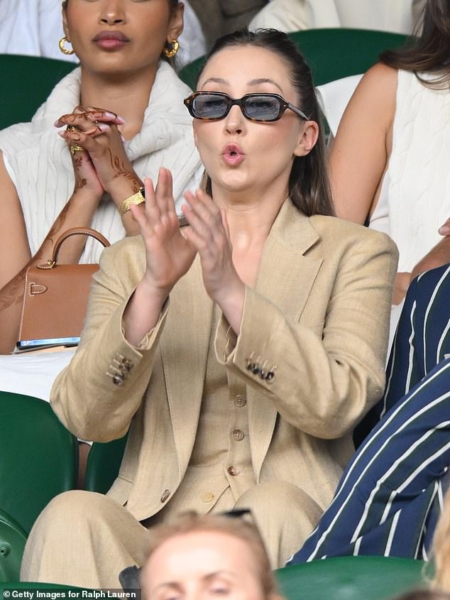 Adolescence star Erin Doherty, 32, put on a very animated display as she watched the Women's Singles at Wimbledon 's centre court on Sunday