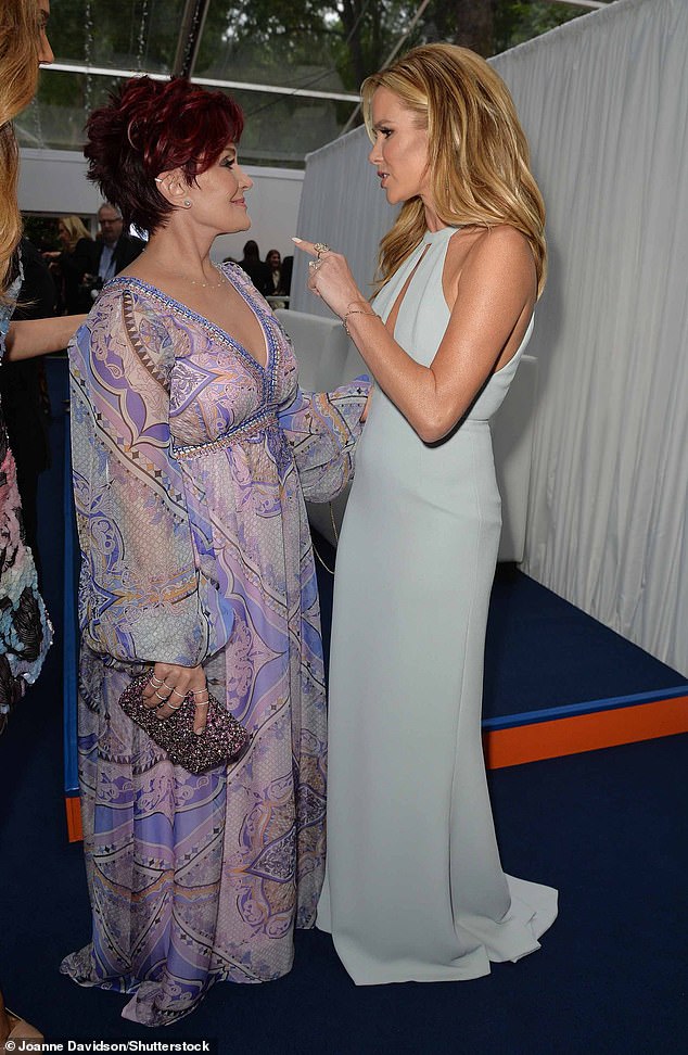 Amanda Holden made a jaw-dropping comment about nemesis Sharon Osbourne's 'Ozempic face' as she reignited THAT feud and said: 'I'd choose my face over my waistline' (pictured together in 2014)