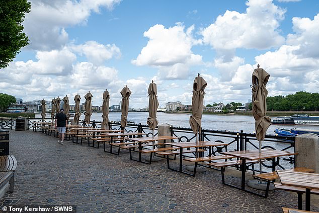 The Trafalgar Tavern's al fresco tables are located on the Thames Path, a narrow walkway running along the banks of the capital's river