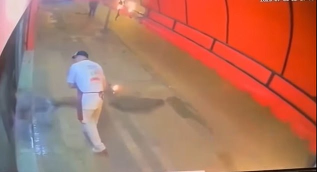 The owner of a nearby shop assisted with putting up the flames until firefighters arrived