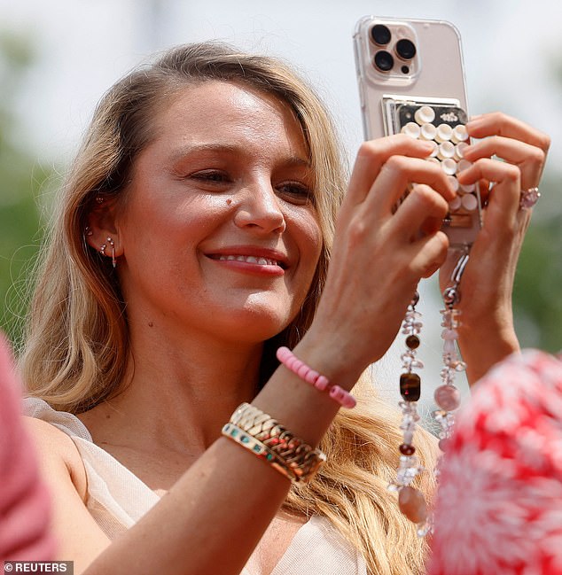 Blake Lively stood proudly by Ryan Reynolds ¿ side on Tuesday as he was honored in his home country of Canada ¿ despite the legal storm still swirling around them