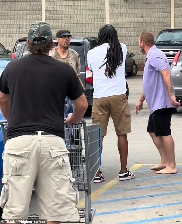 The suspect, a 42-year-old man, is seen being confronted by ordinary shoppers after he rampaged through the Walmart in Michigan